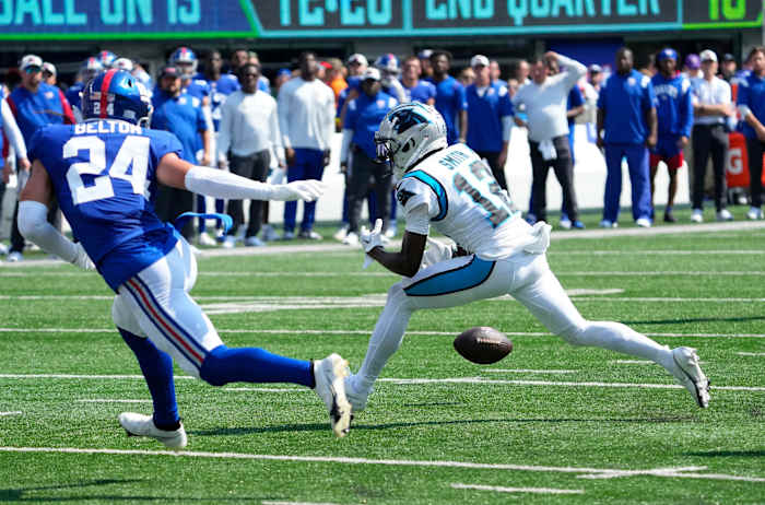 Sep 18, 2022; East Rutherford, NJ, USA; Carolina Panthers wide receiver Shi Smith (12) cannot catch a pass while defended by New York Giants safety Dane Belton (24) in the first half at MetLife Stadium.